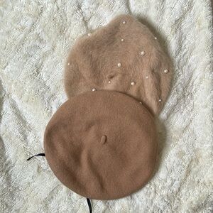 2pcs tan berets with fuzzy fabric along with black ribbon and pearls